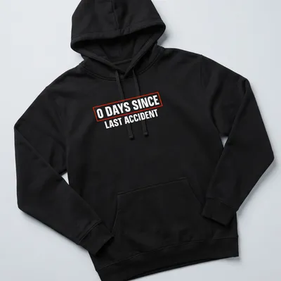 Humorous quote shirt with bold text stating '0 Days Since Last Accident' in red and white. — printed on a unisex hoodie