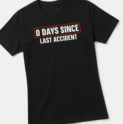 Humorous quote shirt with bold text stating '0 Days Since Last Accident' in red and white. — printed on a women's shirt