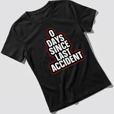 Humorous T-shirt with bold typography stating '0 DAYS SINCE LAST ACCIDENT' in black, white, and red — printed on a women's shirt