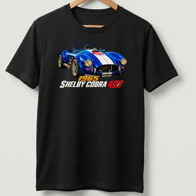 Realistic print of a 1965 Shelby Cobra 427 racing car in blue, white, and red — printed on a unisex t-shirt