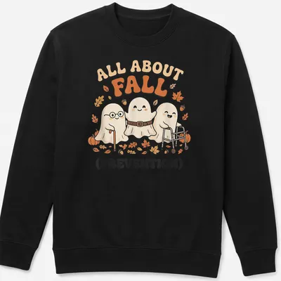 Kawaii cartoon ghosts with the text 'All About Fall (Prevention)' in warm colors — printed on a unisex sweatshirt