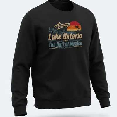 Retro distressed t-shirt featuring a lighthouse and palm trees with printed text about Lake Ontario and the Gulf of Mexico. — printed on a unisex sweatshirt