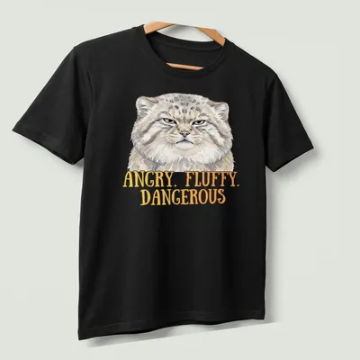 Illustration of an angry fluffy Pallas Cat with bold text above — printed on a unisex t-shirt (angled view)