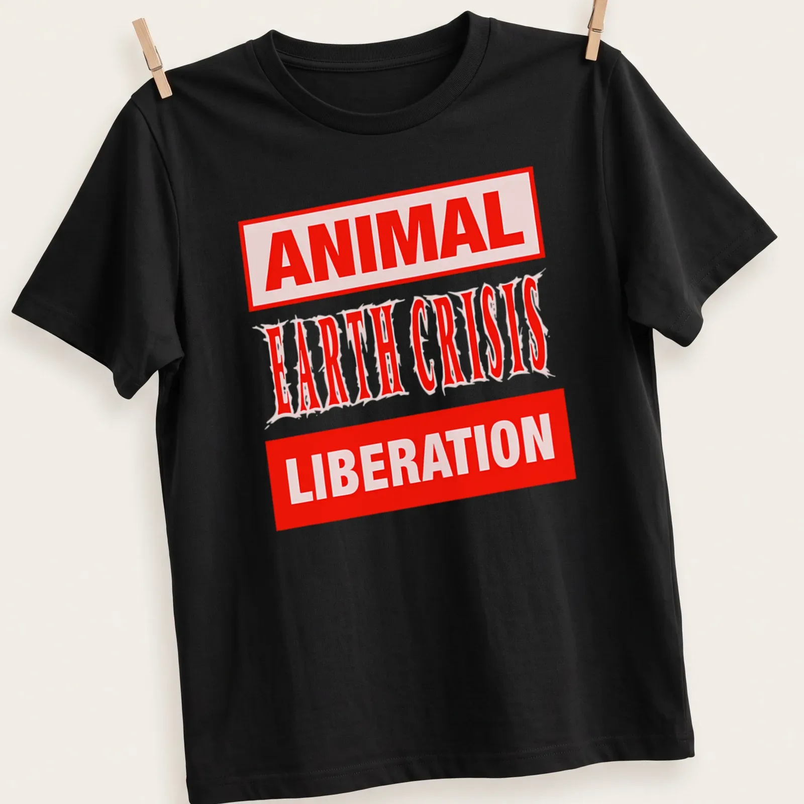 Bold typography t-shirt with the text Animal Earth Crisis Liberation in red and white — printed on a unisex t-shirt