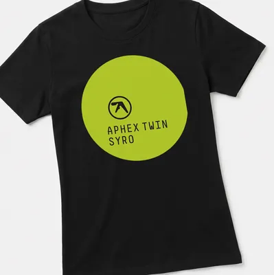 Minimalist Aphex Twin Syro logo in lime green on black fabric — printed on a women's shirt