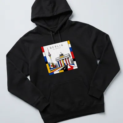 Illustration of Brandenburg Gate and TV Tower in Mondrian style with bold colors — printed on a unisex hoodie