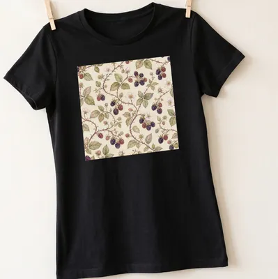 Cottagecore pattern featuring blackberry bramble in floral design. — printed on a women's shirt