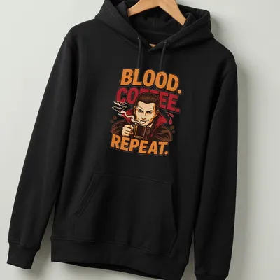 Cartoon vampire enjoying a cup of coffee with humorous text — printed on a unisex hoodie