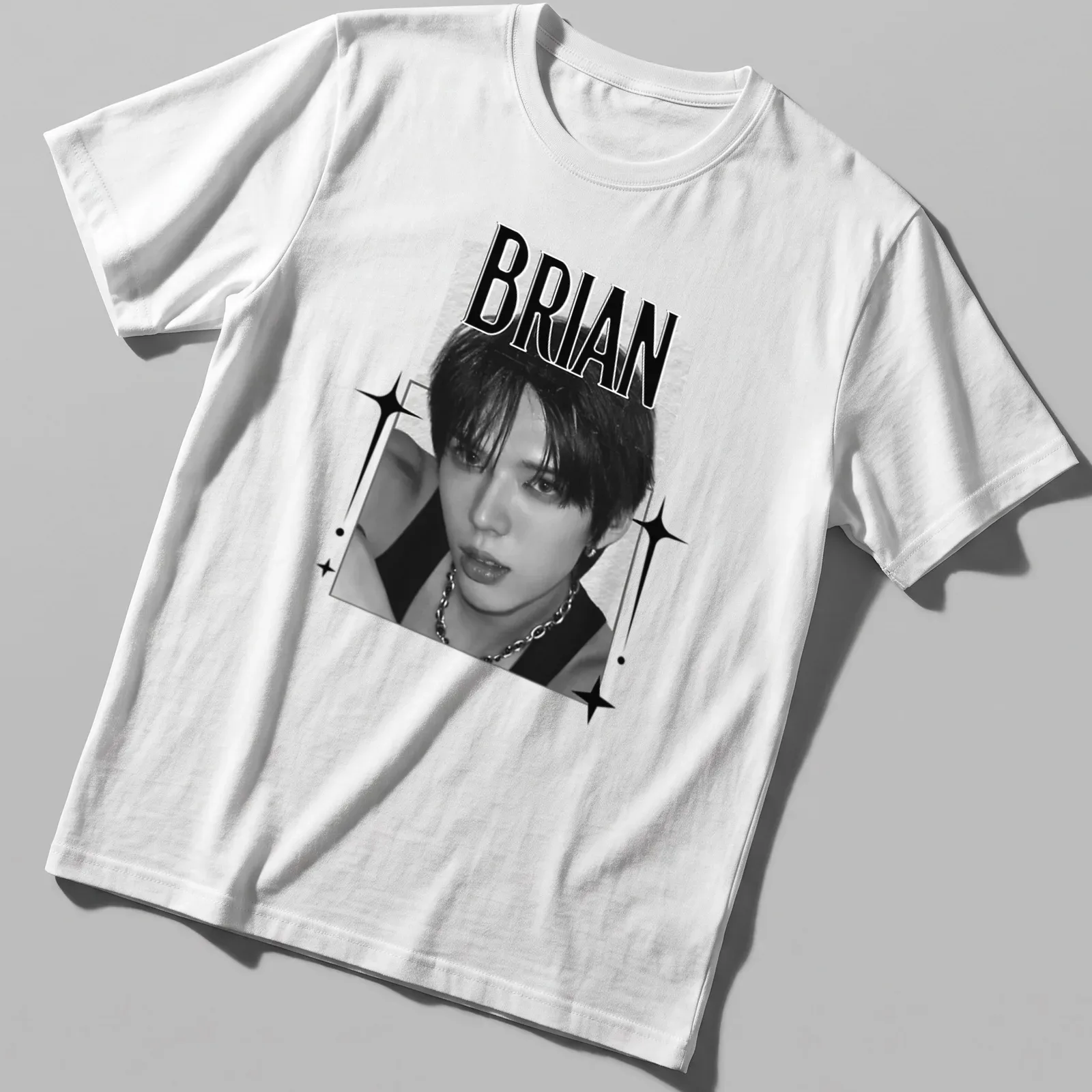 Black and white digital portrait of KPOP member Brian with text below — printed on a unisex t-shirt