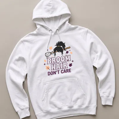 Cartoon broomstick with hair and text reading 'Broom Hair Don't Care' in Halloween colors — printed on a unisex hoodie