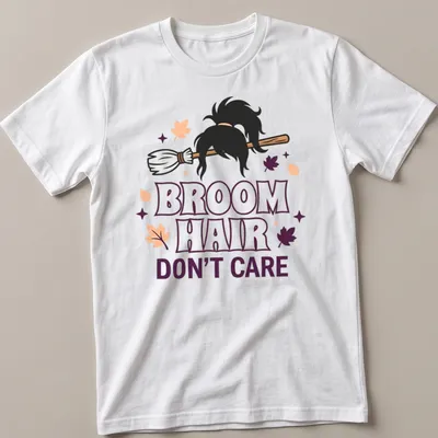 Cartoon broomstick with hair and text reading 'Broom Hair Don't Care' in Halloween colors