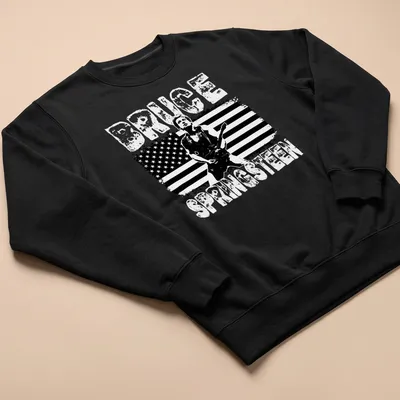 Vintage distressed Bruce Springsteen T-shirt with bold lettering and guitarist graphic — printed on a unisex sweatshirt