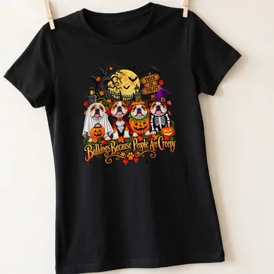 Colorful cartoon Bulldogs in Halloween costumes with humorous text. — printed on a women's shirt