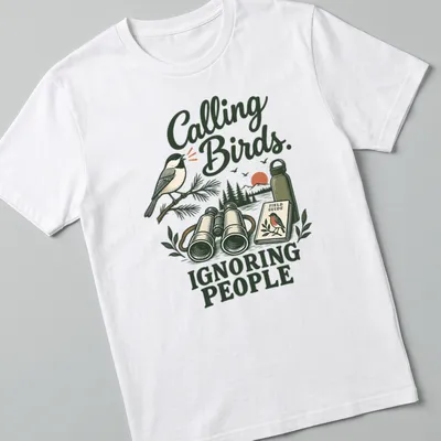 Vintage illustration of a bird with the text 'Calling Birds. Ignoring People' — printed on a unisex t-shirt