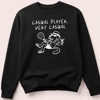 Modern graphic of a tennis padel player with the text Casual Player — printed on a unisex sweatshirt