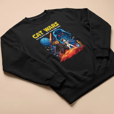 Colorful comic design featuring cats as space characters with playful text — printed on a unisex sweatshirt