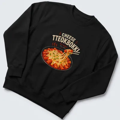 Illustrative shirt featuring colorful Korean Tteokbokki with text about spicy cheesy rice cakes — printed on a unisex sweatshirt