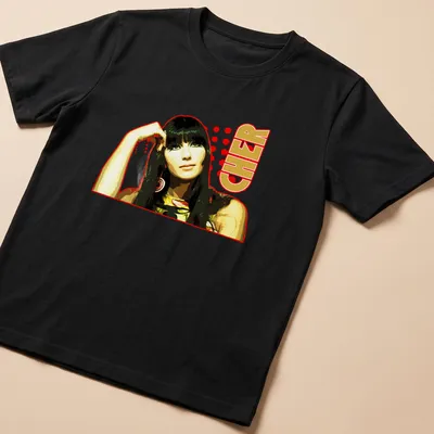 Vintage pop art Cher t-shirt with bold colors and retro design — printed on a unisex t-shirt