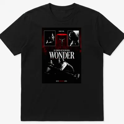 Gothic T-shirt with vintage horror design featuring vampires and ornate lettering.