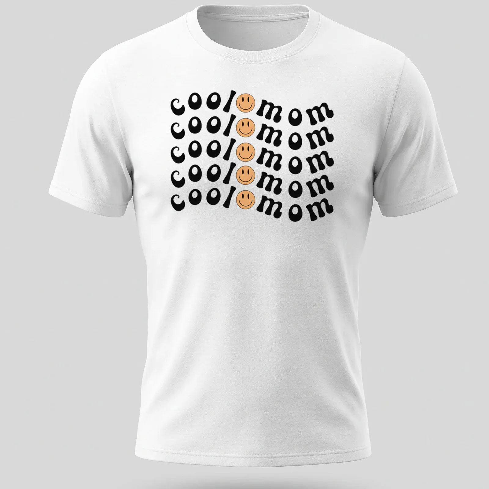 Bold playful Cool Mom T-shirt with smiley face graphic in black, yellow, and peach — printed on a unisex t-shirt