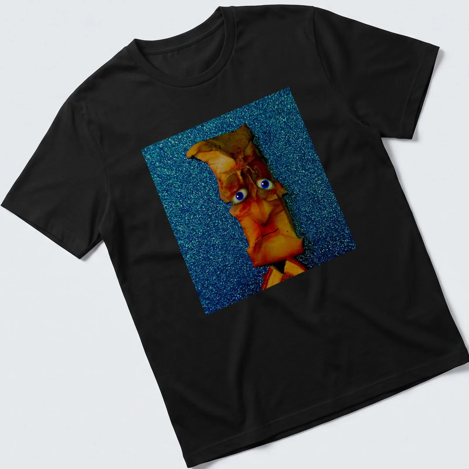 Whimsical apple character with the text 'Corbert Has Core Concerns' in orange, blue, and brown. — printed on a unisex t-shirt