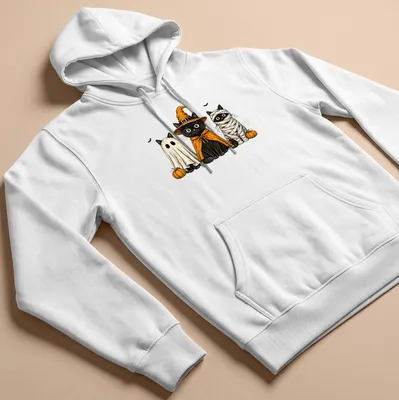 Vintage illustration of black cats in Halloween costumes including ghost and pumpkin — printed on a unisex hoodie