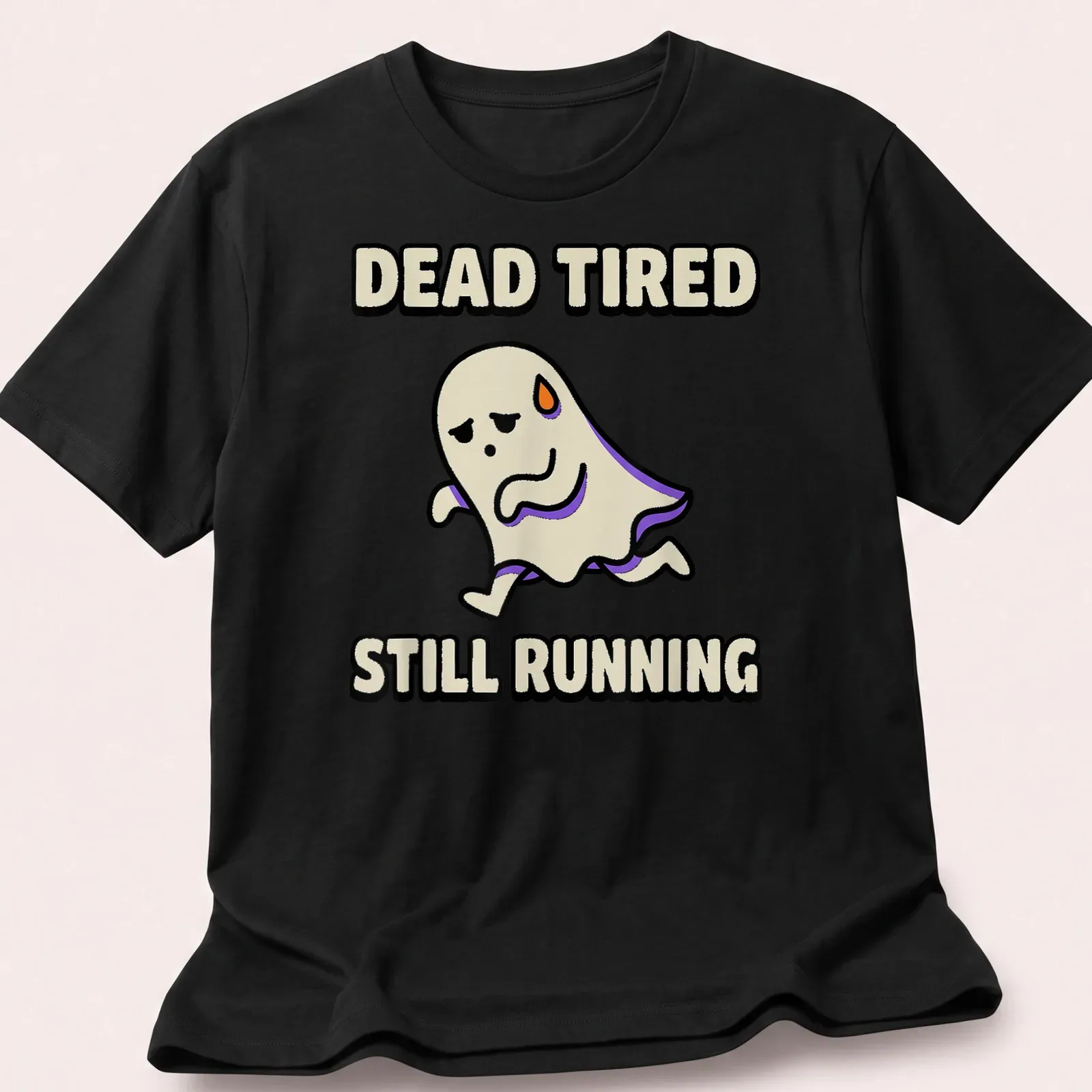 Cartoon ghost graphic with text Dead Tired Still Running in black and purple — printed on a unisex t-shirt