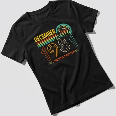Vintage retro T-shirt with a tropical sunset and palm trees, celebrating December 1981. — printed on a women's shirt