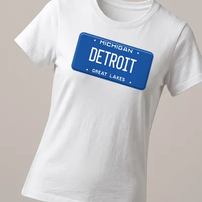 Vintage Michigan Detroit license plate design on a — printed on a women's shirt