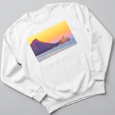 A scenic landscape of Diamond Head and Gold Coast with sunset colors. — printed on a unisex sweatshirt