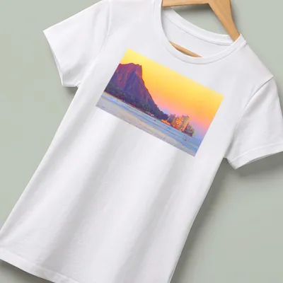 A scenic landscape of Diamond Head and Gold Coast with sunset colors. — printed on a women's shirt