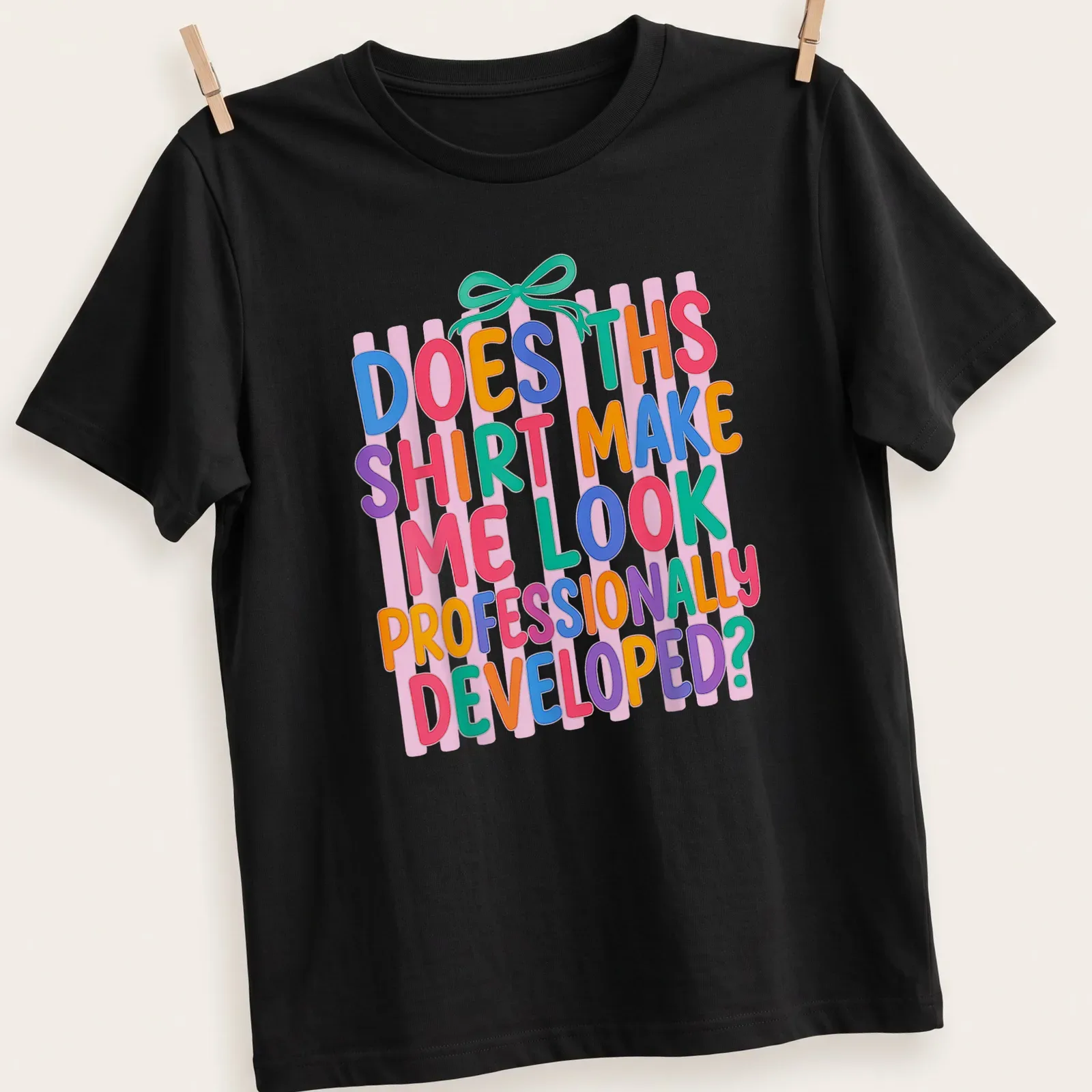 Colorful typography t-shirt with playful text about professional development — printed on a unisex t-shirt