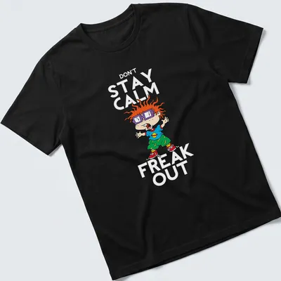 Cartoon Chuckie Finster with the phrase 'Dont Stay Calm Freak' in vibrant colors. — printed on a unisex t-shirt