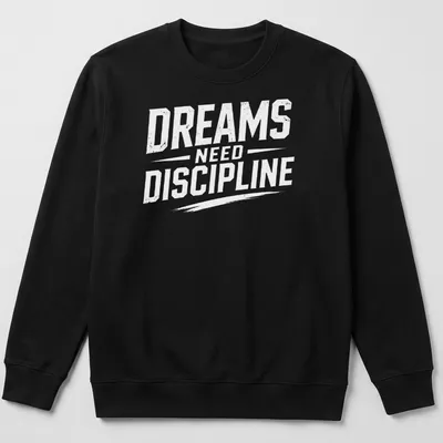 Bold typography t-shirt with the phrase Dreams Need Discipline over a mountain design — printed on a unisex sweatshirt