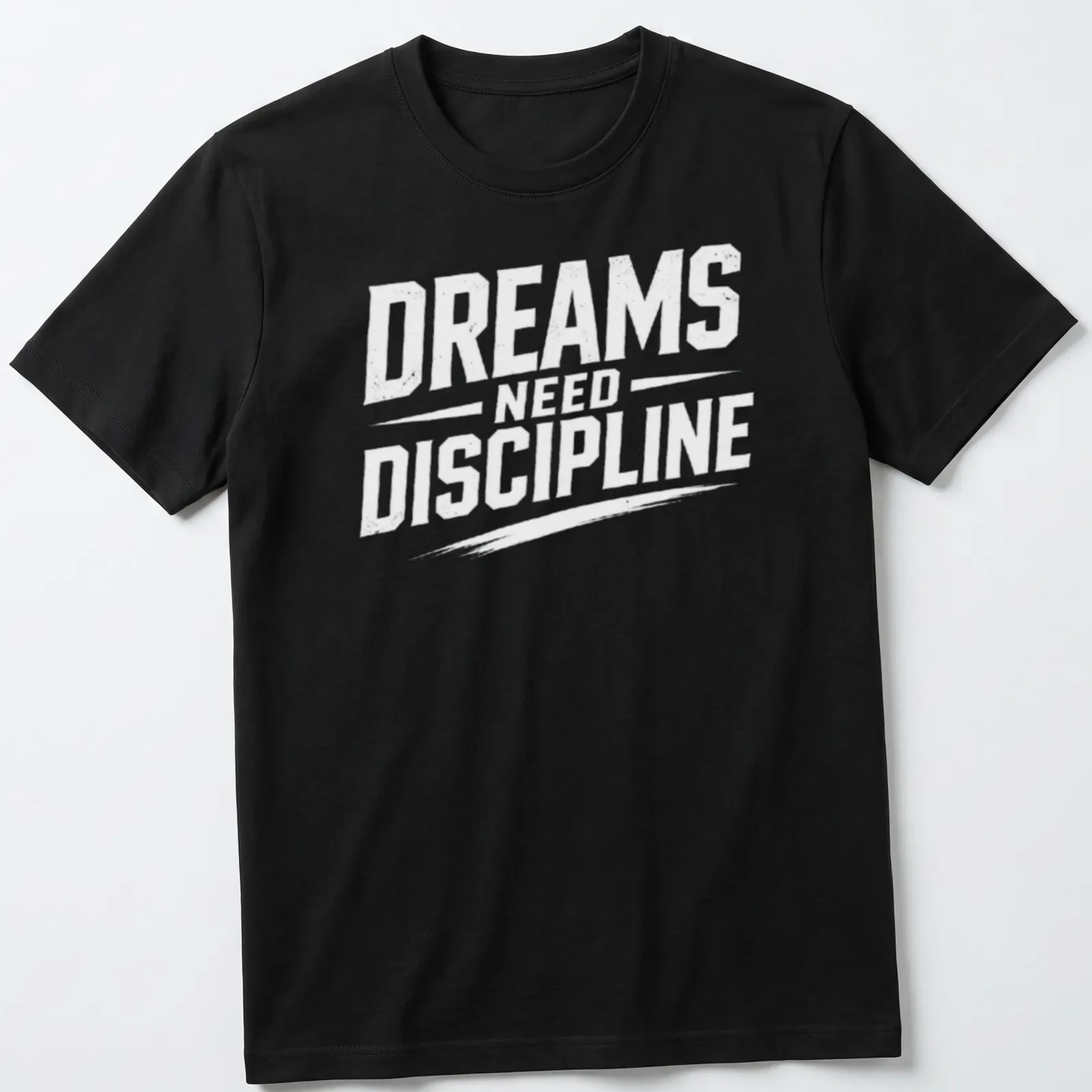 Bold typography t-shirt with the phrase Dreams Need Discipline over a mountain design — printed on a unisex t-shirt