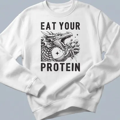 Bold illustration of a dragon flexing with the text Eat Your Protein — printed on a unisex sweatshirt