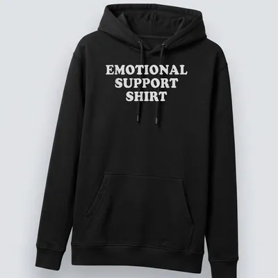 Bold text emotional support t-shirt featuring the phrase 'EMOTIONAL SUPPORT SHIRT' in white — printed on a unisex hoodie