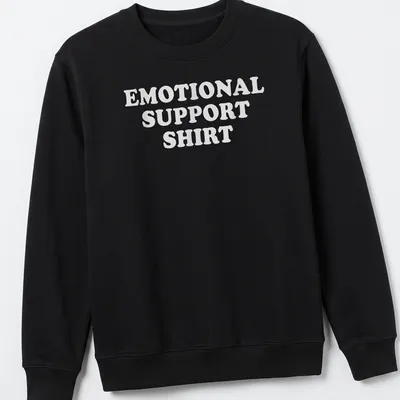 Bold text emotional support t-shirt featuring the phrase 'EMOTIONAL SUPPORT SHIRT' in white — printed on a unisex sweatshirt