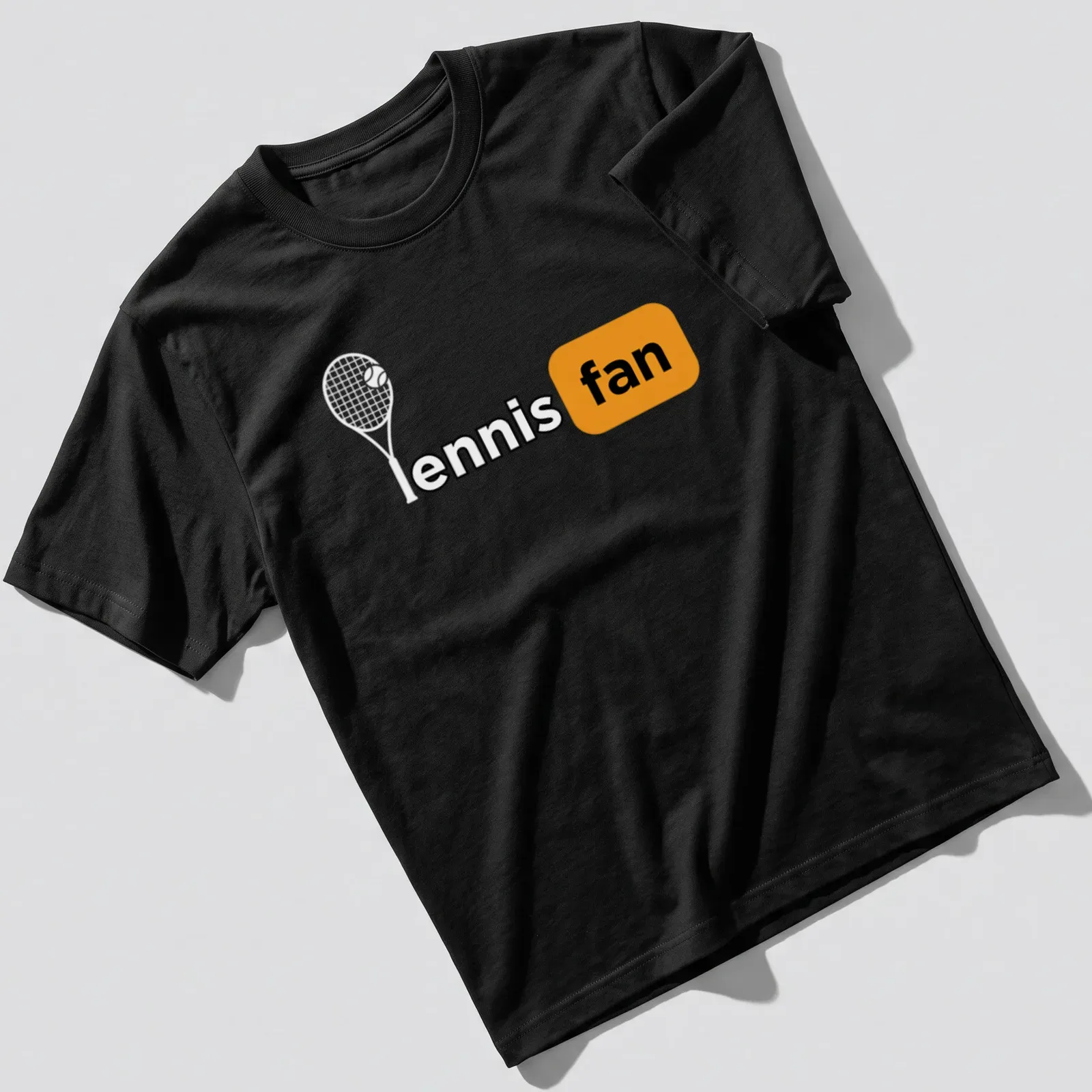 Bold typography t-shirt with 'ennis fan' design in black, orange, and white — printed on a unisex t-shirt