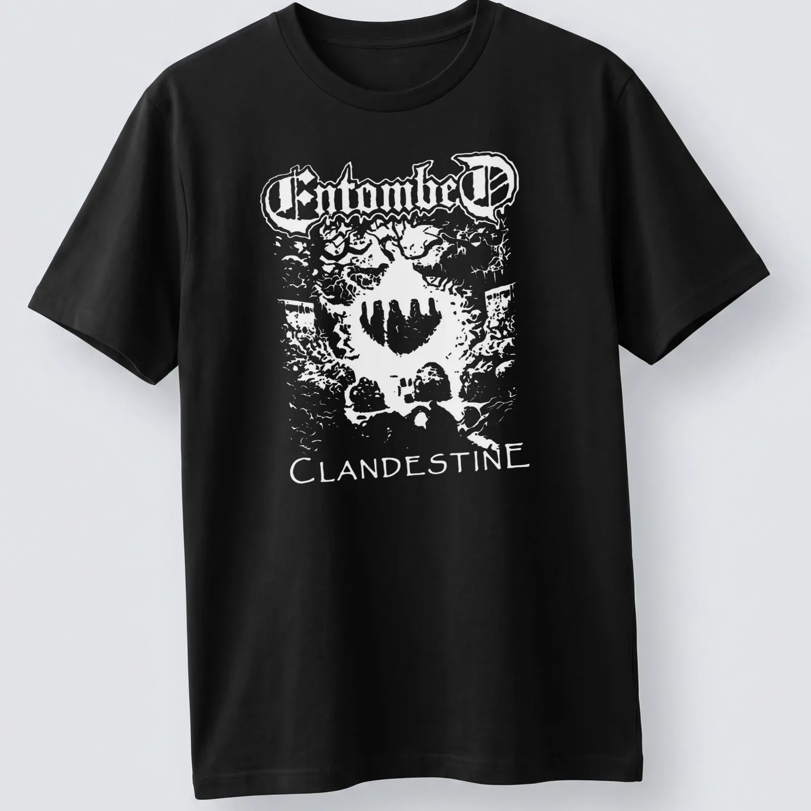 Bold black and white Entombed Clandestine band logo — printed on a unisex t-shirt