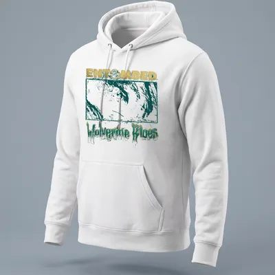 Distressed graphic of a wolverine with gold and teal lettering on a t-shirt. — printed on a unisex hoodie