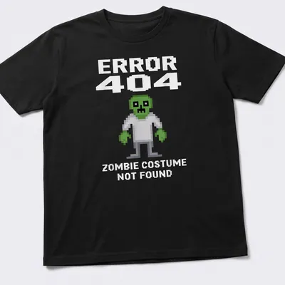 Pixel art of a zombie in green, white, and gray with text reading 'ERROR 404 ZOMBIE COSTUME NOT FOUND' — printed on a unisex t-shirt