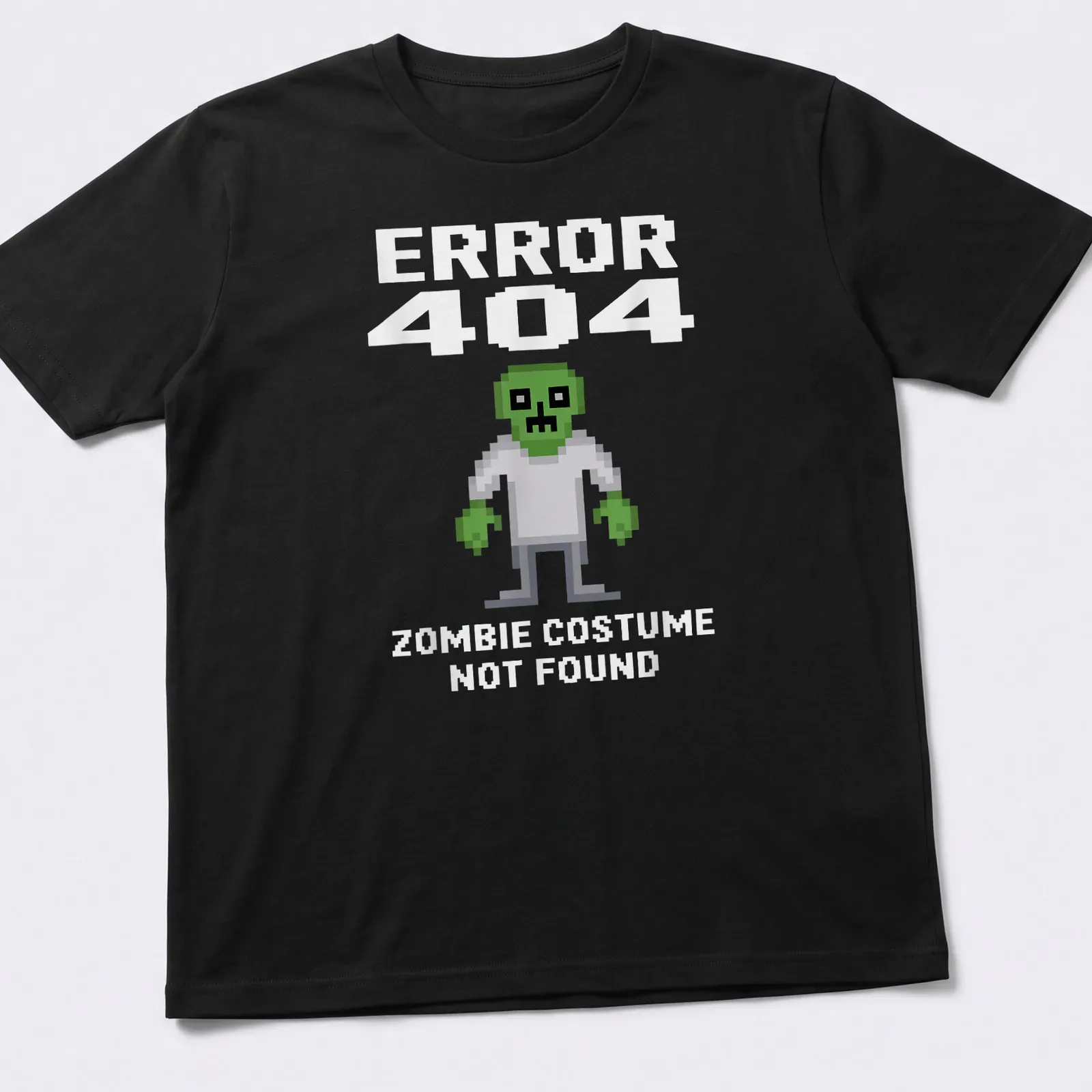 Pixel art of a zombie in green, white, and gray with text reading 'ERROR 404 ZOMBIE COSTUME NOT FOUND' — printed on a unisex t-shirt