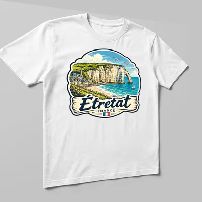 Vintage illustration of Étretat, France coastal landscape in blue and beige — printed on a unisex t-shirt (angled view)