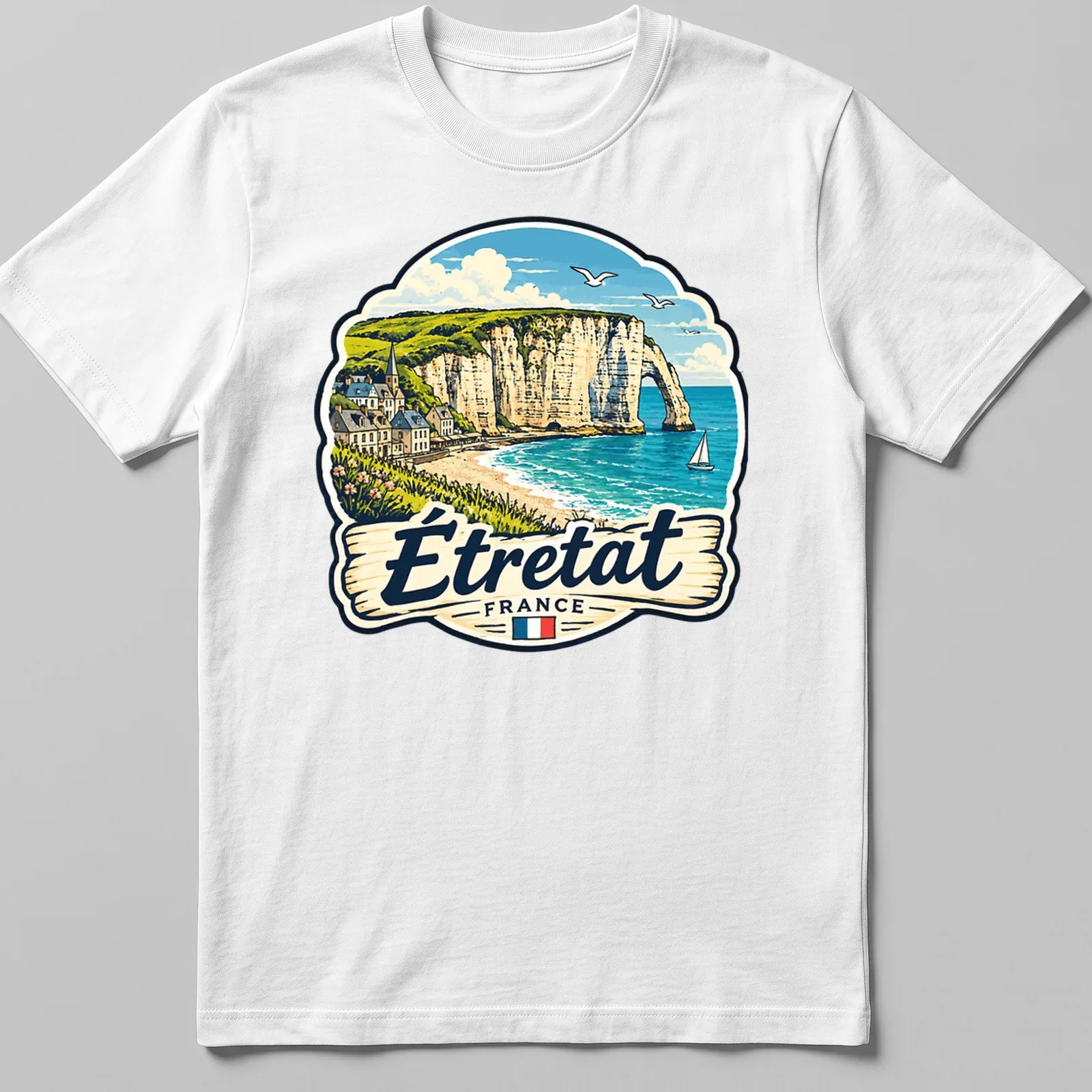 Vintage illustration of Étretat, France coastal landscape in blue and beige — printed on a unisex t-shirt