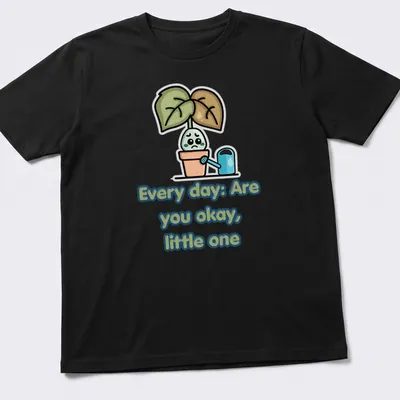 Kawaii cartoon t-shirt with sad potted plant illustration and text — printed on a unisex t-shirt
