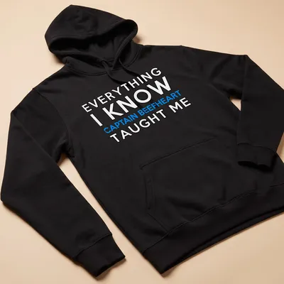 Bold typography shirt featuring Captain Beefheart with blue and white text on black — printed on a unisex hoodie