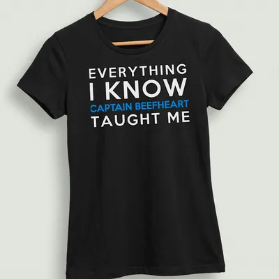 Bold typography shirt featuring Captain Beefheart with blue and white text on black — printed on a women's shirt