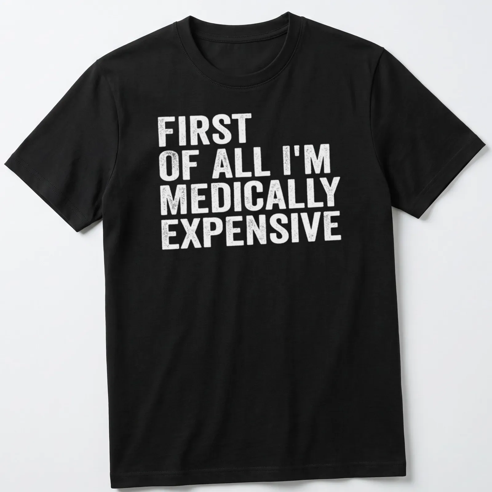 Funny t-shirt with the phrase 'First Of All I’m Medically Expensive' in bold typography — printed on a unisex t-shirt
