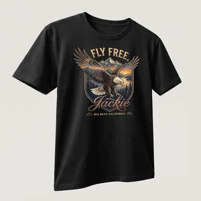 Vintage emblem print featuring a Bald Eagle with the text Fly Free, Jackie Big Bear California — printed on a unisex t-shirt (angled view)